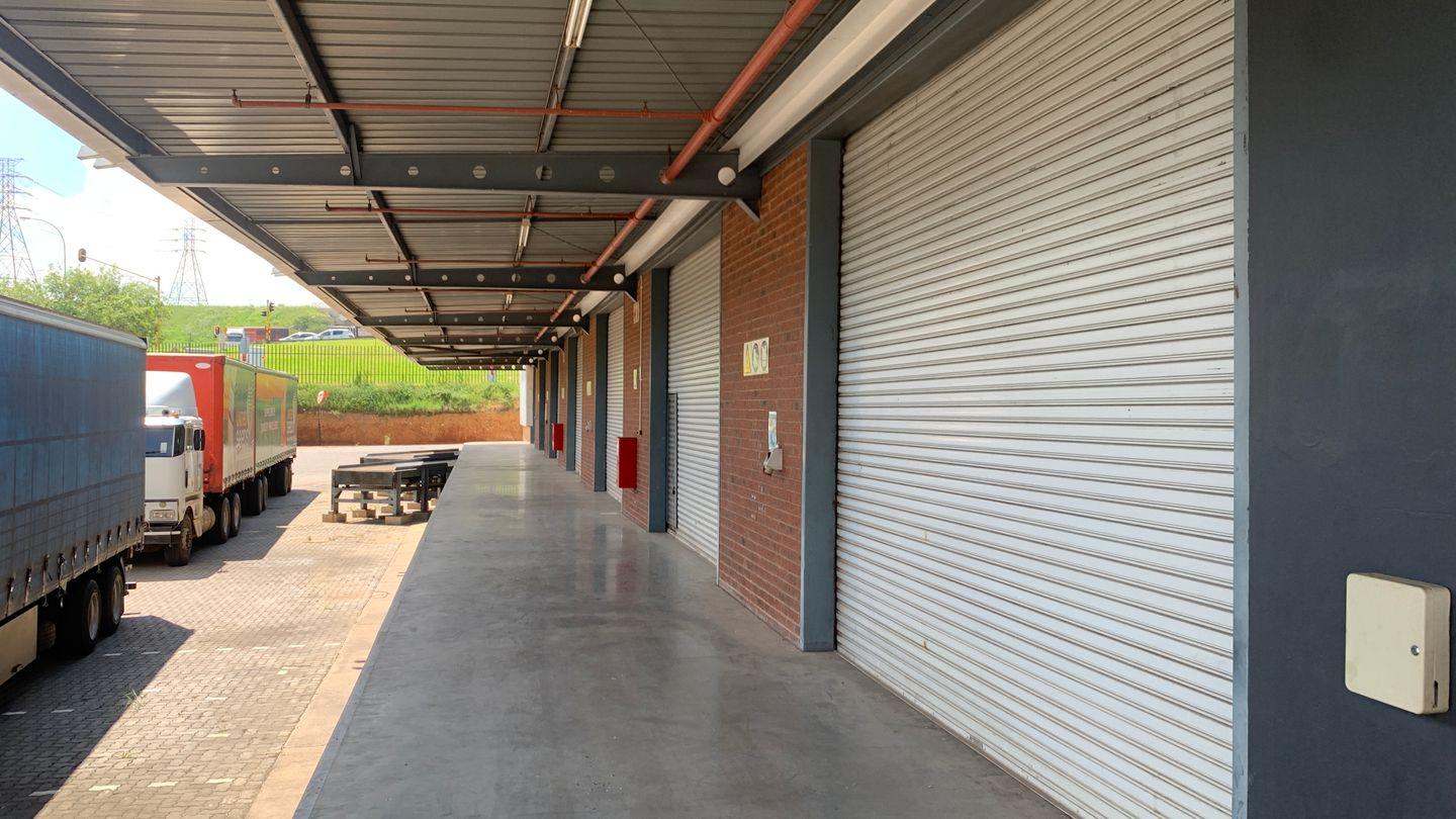 Roller shutter door being installed at a Jet Park Boksburg distribution centre loading bay